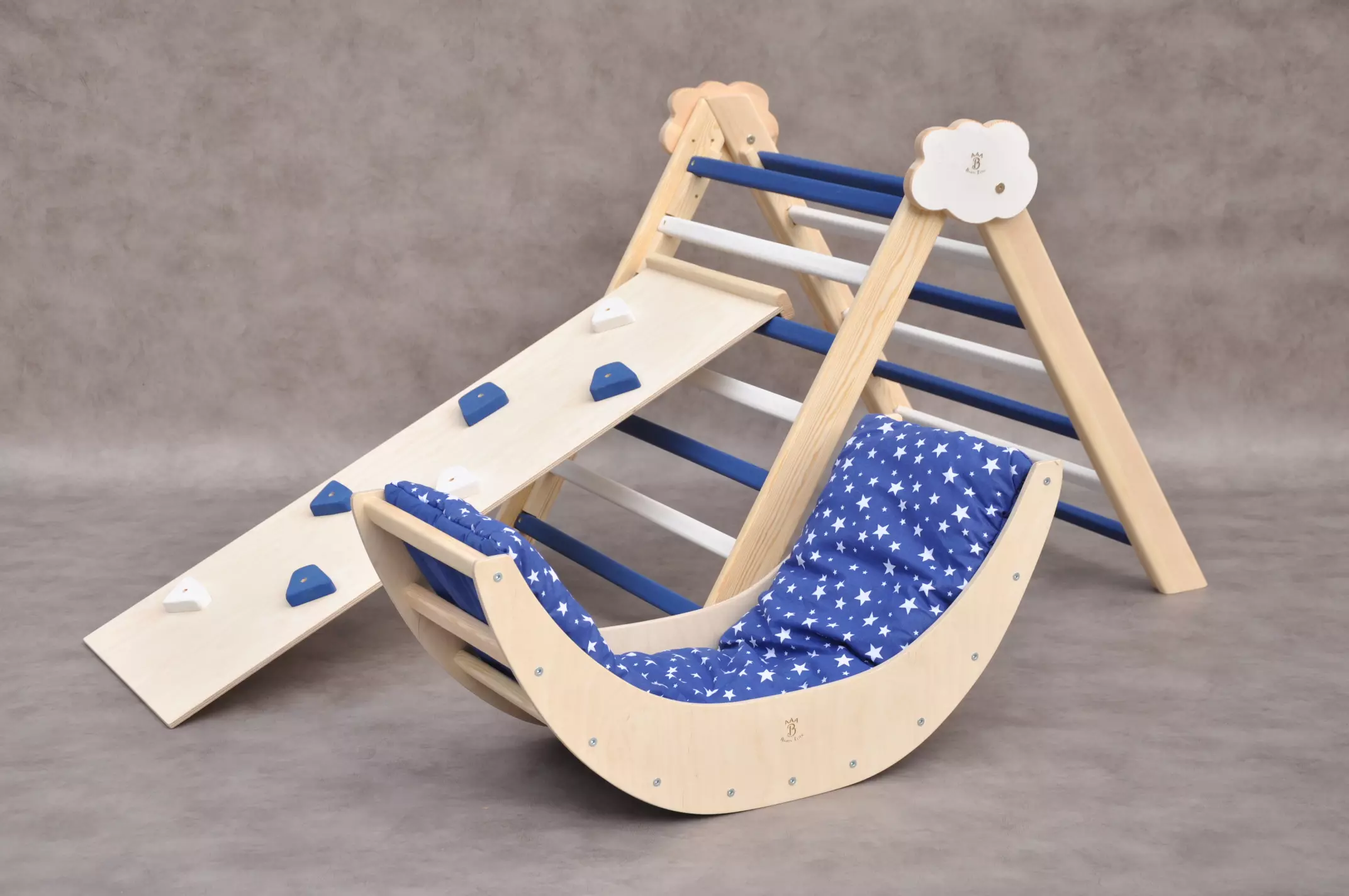 Montessori wooden toys - Pikler triangle & baby arch by Barin Toys - Nautical Cloud baby climber gym and climbing arch with a pillow. Hand selected unfinished wooden climbing frame with navy blue and white color steps.
