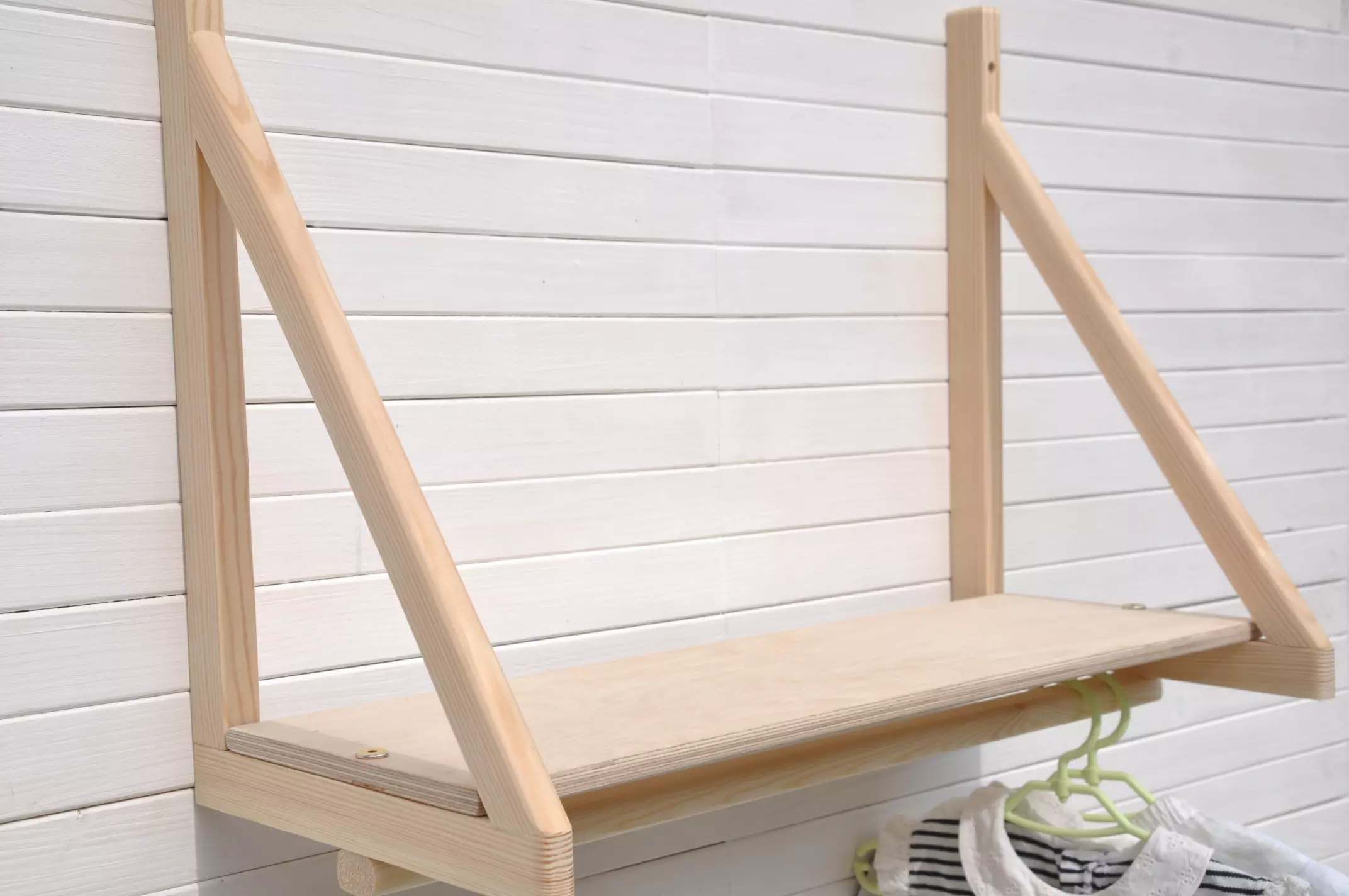 Nursery wall shelves with floating childrens dressing up rail - it's Barin Toys Set Sail children's fancy dress hanging rail and wooden shelf available to order online at BarinToys.co.uk with free UK delivery.