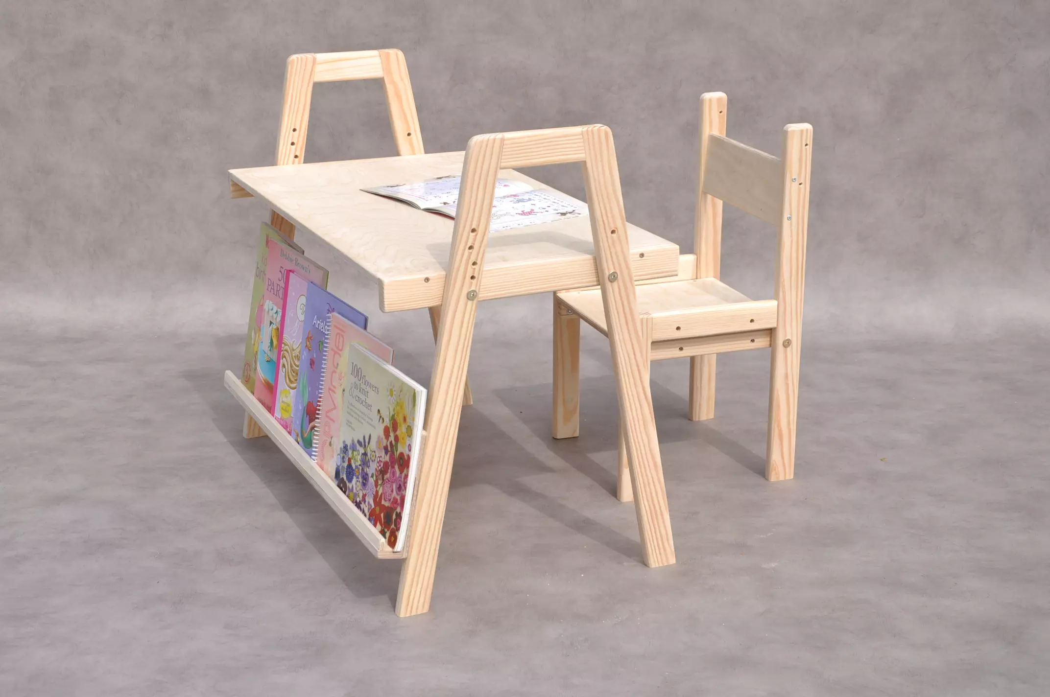Complete Barin Toys adjustable kids desk and chair set with Montessori bookshelf, ages 1–6.
